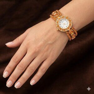 Elegant Gold Women's Watch with Topaz Crystal